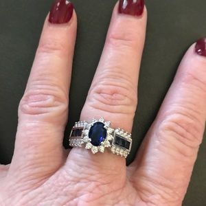 Simulated sapphire and diamond ring